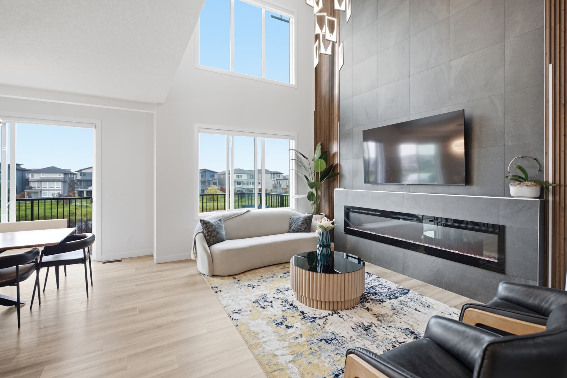 Two-storey great room with fireplace feature wall