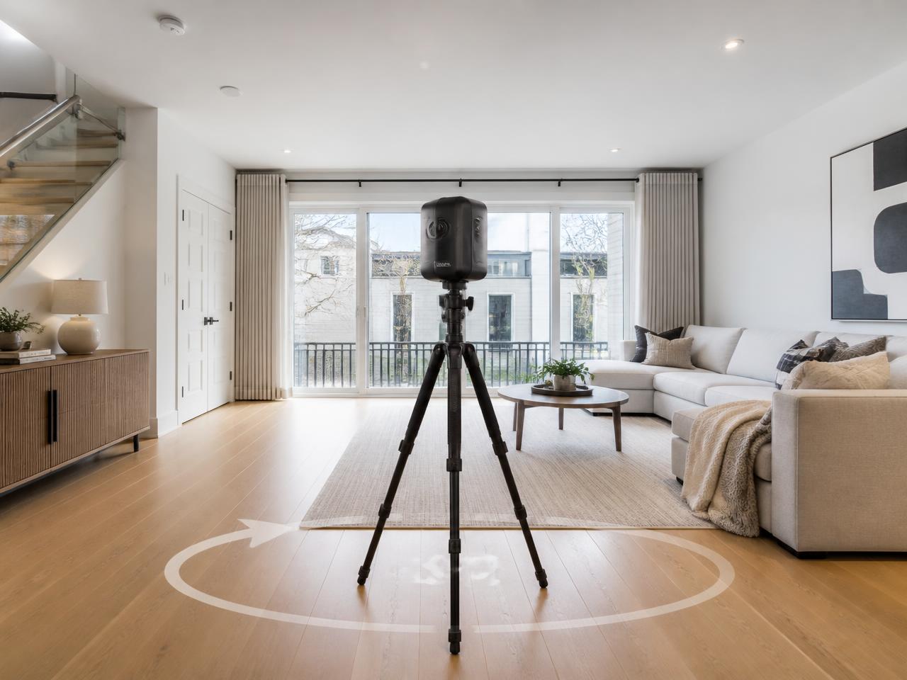 360 degree virtual tour camera on a tripod in a modern living room